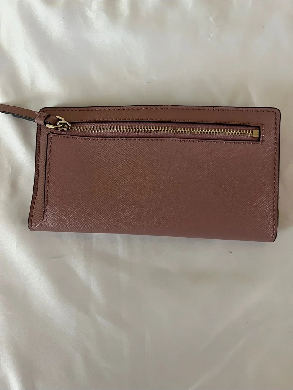 kate spade leather continental wallet in muted rose brown